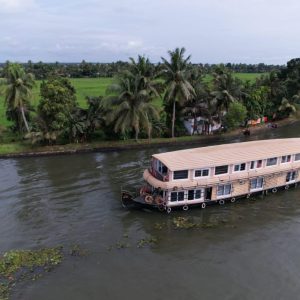 Six bedroom Alleppey houseboat cruising on Vembanad Lake at sunset