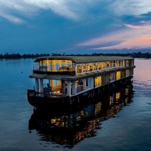 Upper deck lounge with panoramic seating on large houseboat